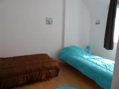 Un ou plusieurs lits dans un hébergement de l'établissement Cottage 3 pièces à Dives-sur-Mer, jardin privé, proche Port Guillaume, piscine, animaux acceptés - FR-1-487-301