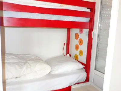 Un ou plusieurs lits dans un hébergement de l'établissement CABOURG - Appartement 3 pièces proche plage avec piscine et tennis - FR-1-487-303