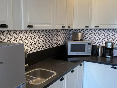 Cuisine ou kitchenette dans l'établissement Bel Appartement Duplex 4 pièces avec Vue sur Port et Terrasse - FR-1-487-314