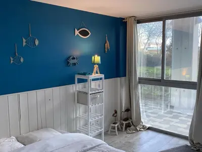 Un ou plusieurs lits dans un hébergement de l'établissement Grand Duplex en Front de Mer avec 3 Chambres, Animaux Acceptés, Equipements Complets, Cabourg - FR-1-487-321