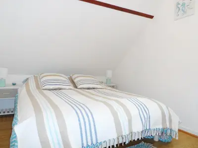 Un ou plusieurs lits dans un hébergement de l'établissement Maison Cozy au Coeur de Cabourg avec Terrasse, Proche Plage, pour 4 Pers., Animaux Acceptés - FR-1-487-328