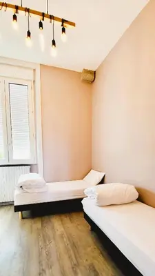 Un ou plusieurs lits dans un hébergement de l'établissement L'Etape du Mont, Family Hostel