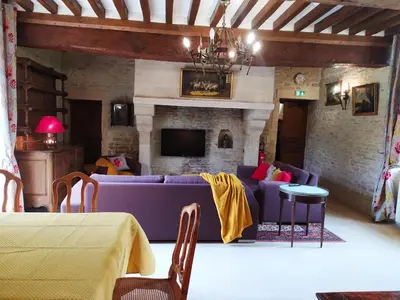 Coin salon dans l'établissement Appartement Prestige Résidentiel 3 chambres 3 salles de bain au Manoir de Mathan à Crépon 5 mn d'Arromanches et 10 mn de Bayeux