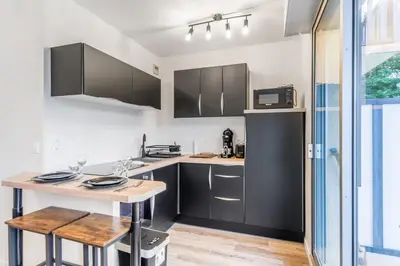 Cuisine ou kitchenette dans l'établissement Studio Aristide - Welkeys