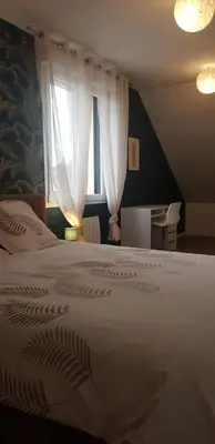 Un ou plusieurs lits dans un hébergement de l'établissement Maison moderne plein coeur de Ouistreham