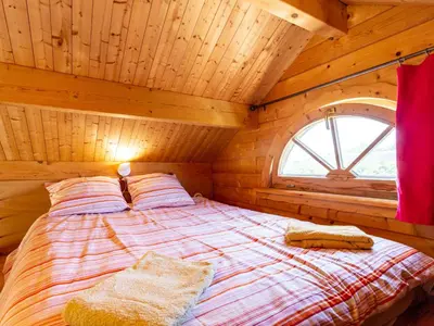 Un ou plusieurs lits dans un hébergement de l'établissement Chalet Le Chamalo by Interhome