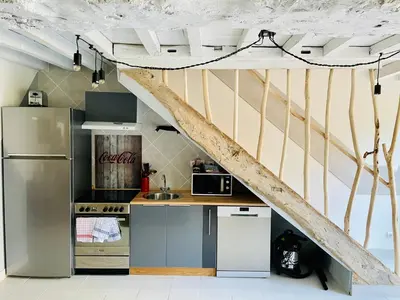 Cuisine ou kitchenette dans l'établissement Grange à grains à l'Ombre d'une Tour