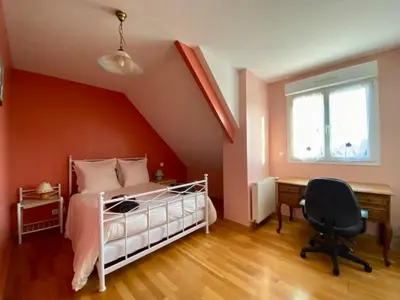 Un ou plusieurs lits dans un hébergement de l'établissement Family Home - Aux portes de l'Histoire