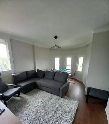 Coin salon dans l'établissement Hyper centre, appart F2 refait à neuf (TV+++)
