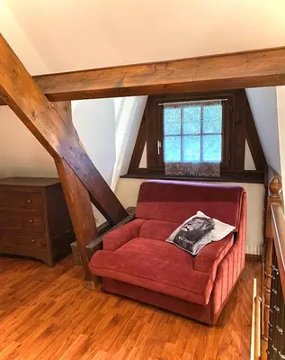 Coin salon dans l'établissement Maison traditionnelle Normande avec piscine