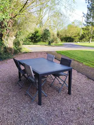 Jardin de l'établissement Maison traditionnelle Normande avec piscine