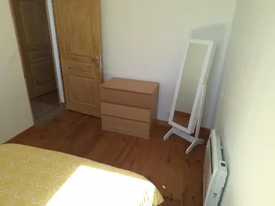 Un ou plusieurs lits dans un hébergement de l'établissement Au Lutin Pommé - Maison de vacances Bretagne