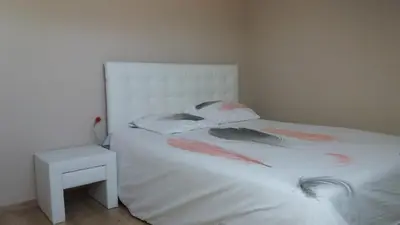 Un ou plusieurs lits dans un hébergement de l'établissement Chambre chez l'habitant LGBT près de la plage naturiste de Granville