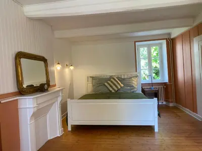 Un ou plusieurs lits dans un hébergement de l'établissement Hübsches Landhaus der Familie mit eigenem Garten