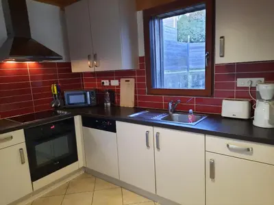 Cuisine ou kitchenette dans l'établissement Cottage Le Héron, à 5 minutes du Mont St-Michel