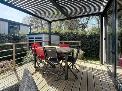 Balcon ou terrasse dans l'établissement Mobil-home Grand Confort à 200m de la plage, 4 pers, piscine chauffée, parking, Wi-Fi inclus - FR-1-361A-8