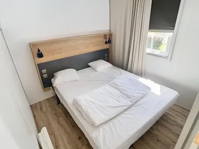 Un ou plusieurs lits dans un hébergement de l'établissement Mobil-Home Grand Confort 4 Pers. à 200m de la plage avec piscine chauffée et parking - FR-1-361A-15