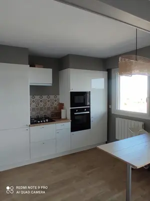 Cuisine ou kitchenette dans l'établissement appartement belle vue
