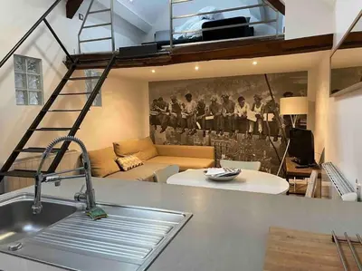 Cuisine ou kitchenette dans l'établissement Ambre, bel appartement proche plage du débarquement