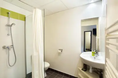 Salle de bains dans l'établissement Résidence Nemea Stanford