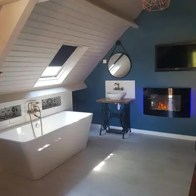 Télévision ou salle de divertissement dans l'établissement Les gîtes équestre de ninon