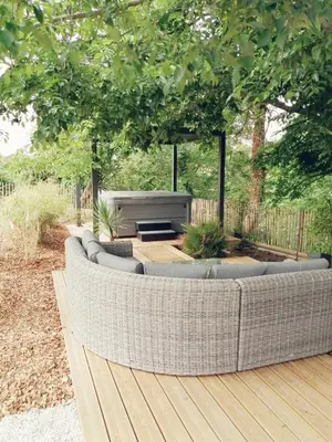 Jardin de l'établissement Cottage climatisé avec terrasse privative et kitchenette