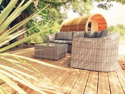 Coin salon dans l'établissement Cottage climatisé avec terrasse privative et kitchenette