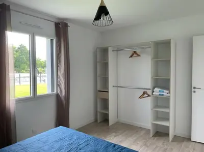 Un ou plusieurs lits dans un hébergement de l'établissement Gîte de vacances