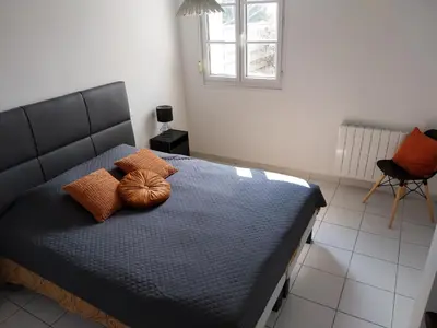 Un ou plusieurs lits dans un hébergement de l'établissement Maison Face au Mont avec extérieur