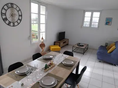 Coin salon dans l'établissement Maison Face au Mont avec extérieur