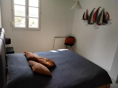 Un ou plusieurs lits dans un hébergement de l'établissement Maison Face au Mont avec extérieur