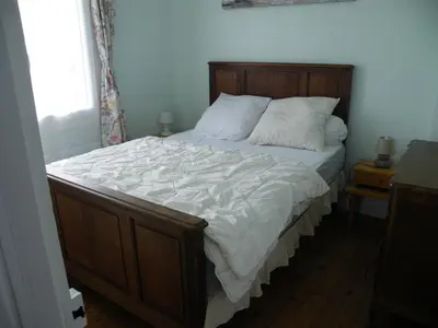 Un ou plusieurs lits dans un hébergement de l'établissement MAISON AU CALME A 10 MINUTE DU MONT SAINT MICHEL