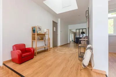 Coin salon dans l'établissement Les Pieds Dans L'Eau - Bel appartement - Vue mer
