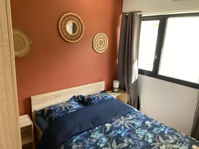 Un ou plusieurs lits dans un hébergement de l'établissement Escapade Courseullaise