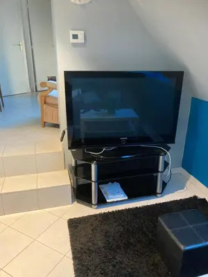 Télévision ou salle de divertissement dans l'établissement A proximité des plages Normandes