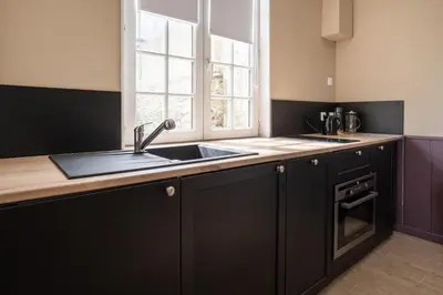 Cuisine ou kitchenette dans l'établissement Studio Les Ruets