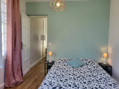 Un ou plusieurs lits dans un hébergement de l'établissement Maison Familiale, Plage à 250m, Calme, Jardin, Terrasse, WIFI - FR-1-465-75