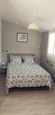 Un ou plusieurs lits dans un hébergement de l'établissement Chambre d'hôtes sur les plages du débarquement