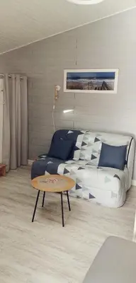 Coin salon dans l'établissement Chambre d'hôtes sur les plages du débarquement