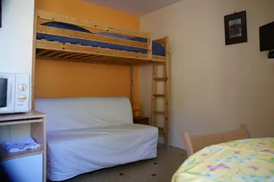 Un ou plusieurs lits dans un hébergement de l'établissement Au Coeur de Bourg CSM
