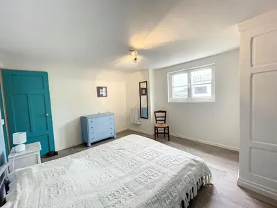 Un ou plusieurs lits dans un hébergement de l'établissement Villa proche Plage et Centre, Jardin Clos, Wifi, Chien possible - FR-1-361-431