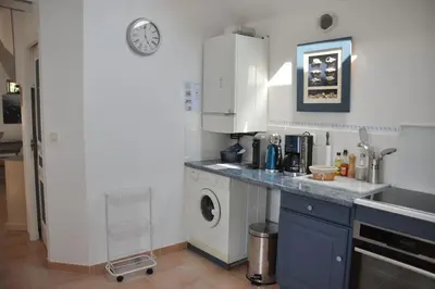 Cuisine ou kitchenette dans l'établissement Le Pressoir