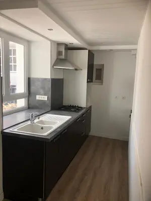 Cuisine ou kitchenette dans l'établissement Authentique maison de pêcheur à Port-en-Bessin