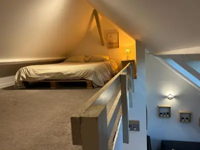 Un ou plusieurs lits dans un hébergement de l'établissement studio duplex - Bord de mer
