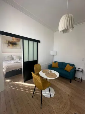 Un ou plusieurs lits dans un hébergement de l'établissement La Nacre - Logement de charme - Cabourg