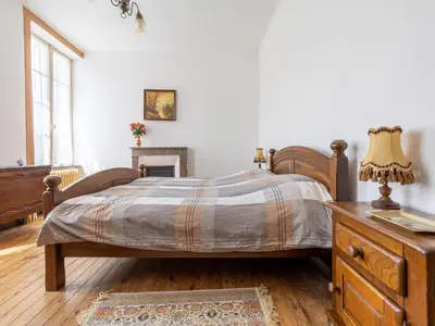 Un ou plusieurs lits dans un hébergement de l'établissement Normandy Fireplace Retreat