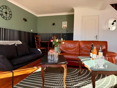 Coin salon dans l'établissement Gîte Gold - La Ferme Delaunay