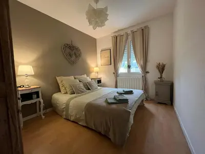 Un ou plusieurs lits dans un hébergement de l'établissement Le 4 Maison de charme proche de la plage wifi