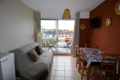 Coin salon dans l'établissement Appartement au pied de la plage - Balcon - Parking