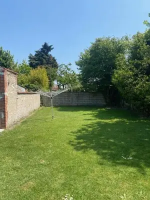 Jardin de l'établissement Maison cosy en plein coeur de Ouistreham